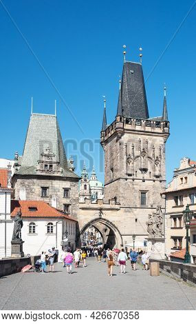 Old Cprague, Czech Republic - July 24, 2019: Harles Bridge In Center Of Prague. Its Construction Sta