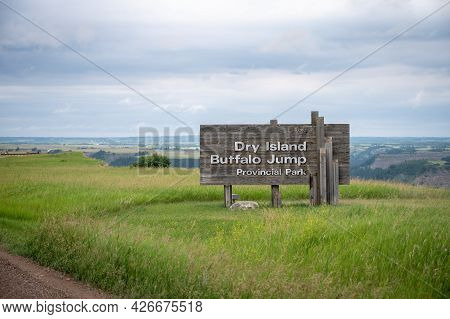 Huxley, Alberta - July 4, 2021: Sign At The Entrance To Dry Island Buffalo Jump Provincial Park Near