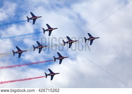 Paris, France - July 14 2021: The French Air Patrol (french: Patrouille De France) Performing A Demo