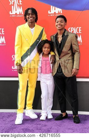 Ceyair Wright, Harper Leigh Alexander, and Cedric Joe at the Los Angeles premiere of 'Space Jam: A New Legacy' held at the Regal LA Live in Los Angeles on July 12, 2021.