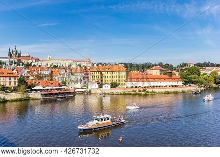 Boats On The River Moldau (vltava) In Historic City Prague, Czech Republic