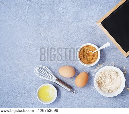 Ingredients For Homemade Oat Pancake With Whole Grain Oat, Coconut Sugar, Vanilla Syrup, Organic Egg
