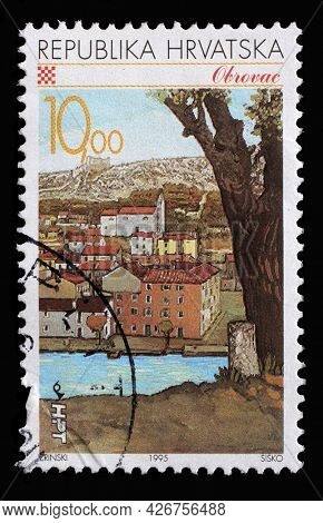 ZAGREB, CROATIA - SEPTEMBER 03, 2014: A stamp printed in Croatia shows Obrovac, Series Croatian Towns, circa 1995