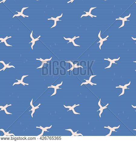 Seamless Pattern With White Birds On Bluebackground. Silhouettes Of Seagulls Flying In The Sky. Vect