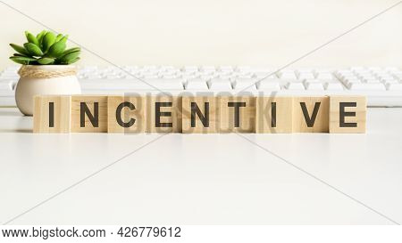 Incentive Word Made With Wooden Blocks, Concept