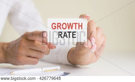 'growth Rate' Card In The Woman's Hands. Business, Ethics, Advertising, Marketing.