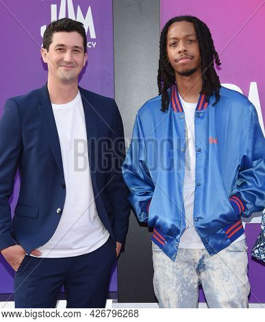 LOS ANGELES - JUL 12: Tony Rettenmaier and Juel Taylor arrives for the 'Space Jam: A New Legacy' World Premiere on July 12, 2021 in Los Angeles, CA