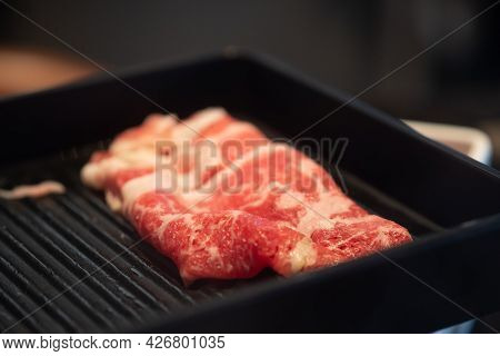 Close Up Fresh Raw Marbled Pork Slice For Shabu In Korean Or Japanese Restaurant. Preparing Raw Mate