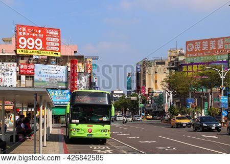 Chiayi, Taiwan - November 30, 2018: People Wait At The Bus Station In Chiayi, Taiwan. Chiayi Is A Ma