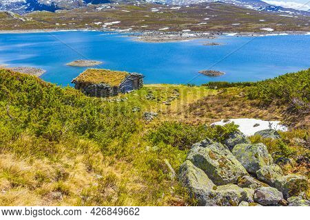 Vavatn Lake Panorama Landscape Cottages Huts Snowy Mountains Hemsedal Norway.