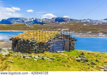 Vavatn Lake Panorama Landscape Cottages Huts Snowy Mountains Hemsedal Norway.