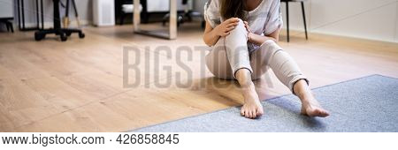 Slip And Fall Accident. Woman Lying Down On Slippery Floor