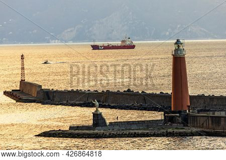 Port Of Naples,italy.early Morning View Of The Lighthouse On The Island Of St. Vincenzo,mentioned In