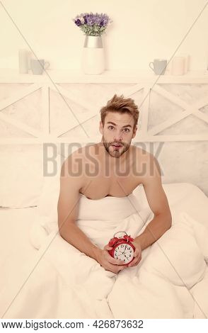 Its Time To Wake Up From Dream. Sexy Man Wake After Sleep. Handsome Guy Hold Clock In Bed. Wake Up T