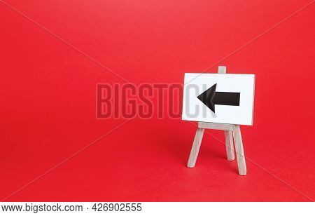 Left Arrow Easel Sign. Direction Pointer. Hint, Help In Navigation. Minimalism. Advertising And Attr