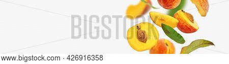 Flying Fresh Ripe Juicy Peaches With Green Leaves Isolated On Gray Background. Whole And Halved Peac