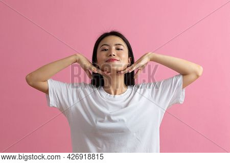 Close Up Portrait Of Young Korean Asian Chinese Woman Doing Facebuilding Yoga Face Gymnastics Yoga M