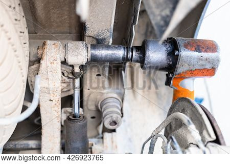 Disassembling Fastening Of Broken Car Shock Absorber (focus On Pneumatic Screwdriver)
