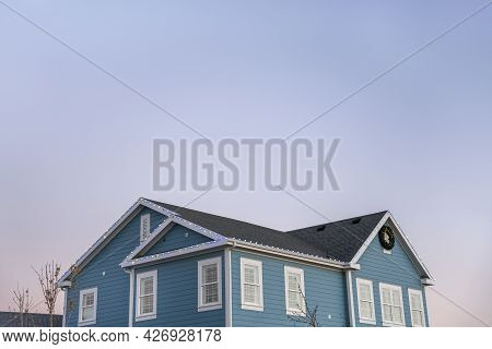 Low Angle View Of A Traditional Two-storey House Exterior