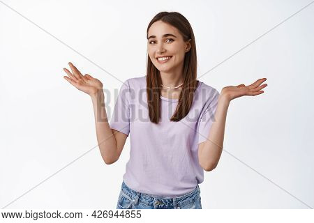 Oops Sorry Silly Mistake. Smiling Girl Shrugging Shoulders With Awkward Grin, Did Not Know, Apologiz