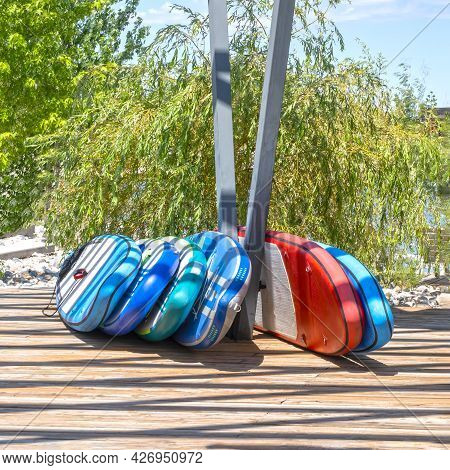 Free Sap Boarding Boards On The Pier Near The Water Against The Background Of Trees