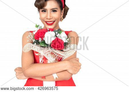 Beautiful Woman Toothy Between Red Tulips Flower, She Looks Freshy In Sexy Retro Style Fashion And R