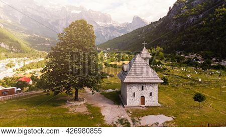 A Catholic Church In The Village Of Theth In Prokletije In The Acursed Mountains Of Albania. The Com