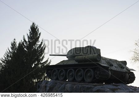 Monument With The Soviet T-34 Tank In Memory Of The Soldiers Of The Great Patriotic War. Monument To
