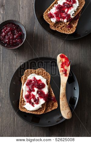 bread with creme fraiche and lingonberry jam 