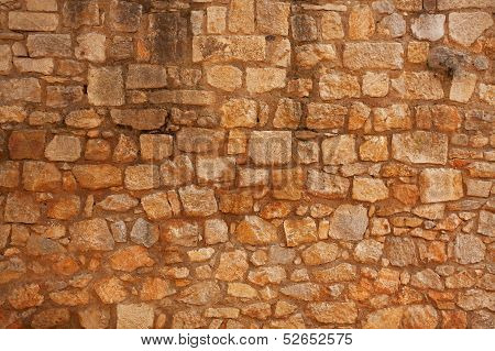Old Brick Wall Of Rough Stone