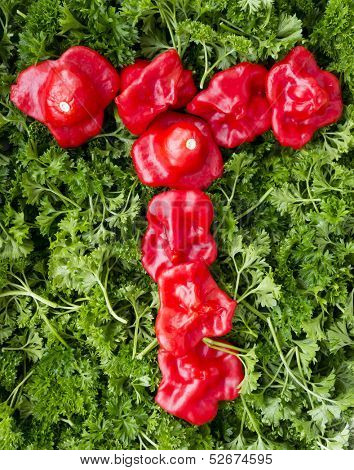 Letter T. Pepper and parsley.