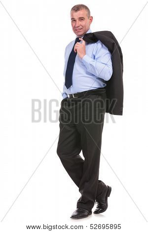 full length picture of a business man smiling for the camera while holding his jacket over his shoulder and a hand in his pocket. on a white background