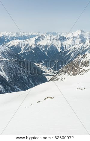 Alpine Valley Surrounded With Mountains