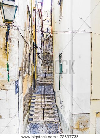 Cobble Stone Street In Old Town Of Lisbon