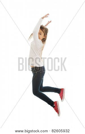 Little pretty girl jumping with joy