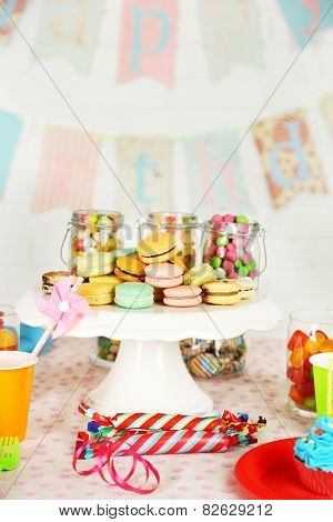 Prepared birthday table with sweets for children party