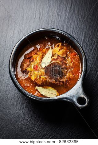 Sauerkraut soup - cabbage soup with mushrooms and sujuk ( spicy sausage)
