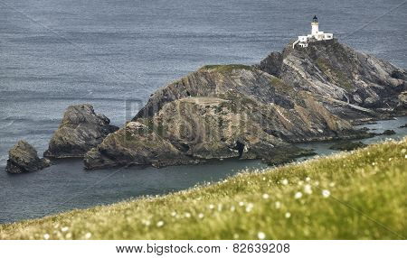 Scottish Coastline Landscape With Lighthouse In Shetland Islands. Scotland. Uk