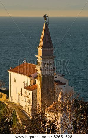 Saint George church and bell tower at city of Piran in Istria
