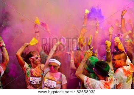 MAMAIA, CONSTANTA, ROMANIA - JULY 26: Mamaia color run 2014, in Mamaia, Constanta, on July 26, 2014. People from all walks of life participating in the fun summer run