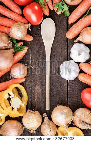 Healthy,fresh vegetables and wooden spoon