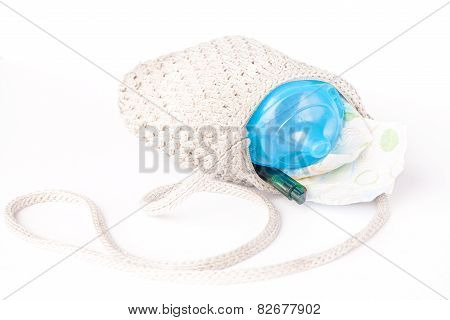 overfilled small purse of a mother
