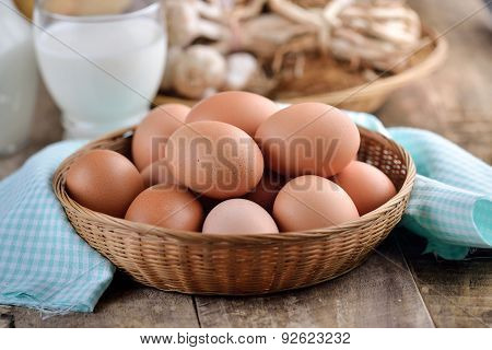 Easter Egg In A Basket On Wodden Table