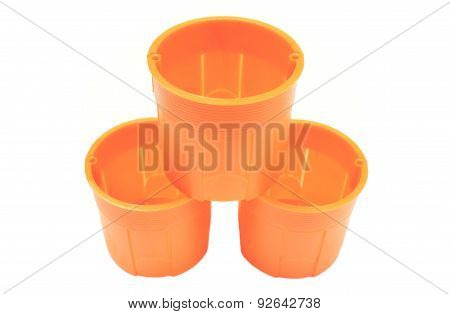 Stack Of Orange Electrical Boxes On White Background