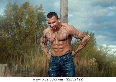 Man Tied To A Pillar.