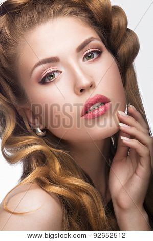Beautiful girl with a light Nude make-up and blond hair. Beauty face.