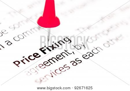 Words Price Fixing Pinned On White Paper With Red Pushpin