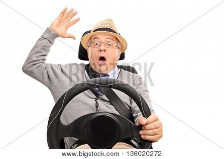 Senior panicking shot in the moment before a car accident isolated on white background