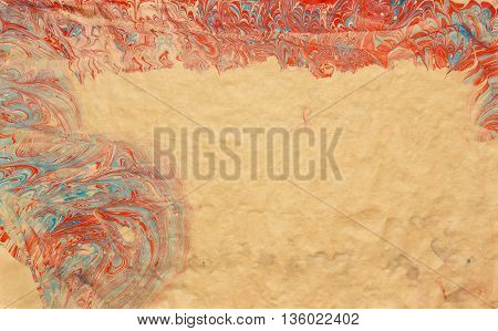 Pattern from traditional Turkish Ebru technique. painting on water followed by paper prints. natural paint used. ebru imprint on beige kraft paper