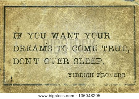 If you want your dreams to come true - ancient Yiddish proverb printed on grunge vintage cardboard